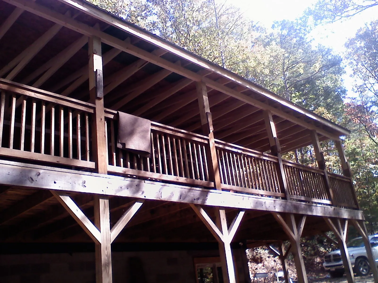Timber framing under a new elevated porch and deck — Roof Leak Repair in Bonner Springs by Roofing Brothers